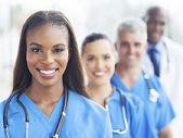 group of happy healthcare workers line up